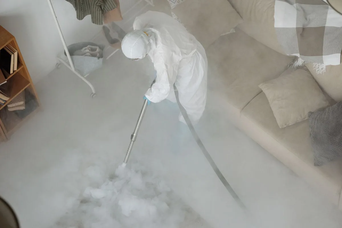 Biohazard cleanup technician in protective equipment, Port Angeles, WA
